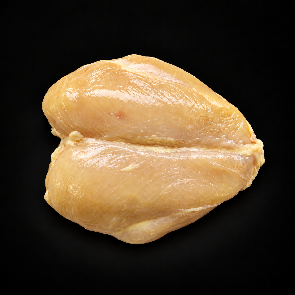 Petto di pollo intero Penna D’Oro italiano su sfondo nero.